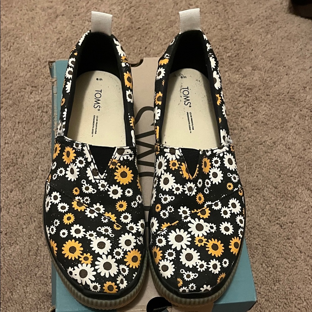 TOMS Black and Yellow Floral Slip-Ons